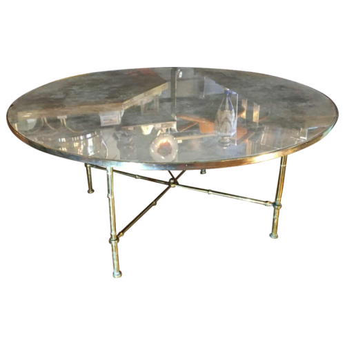 Maison Baguès, round brass "Bamboo" coffee table, gilt mirror glass, circa 1940